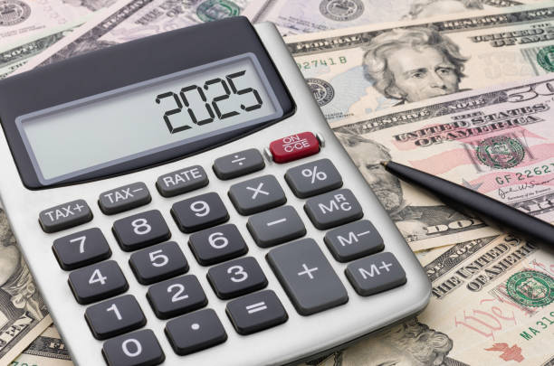 istock Calculator with money - 2025 2184304154