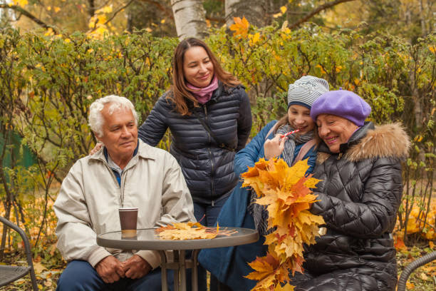 istock Happy multi-generation family having fun in nature 2184306379