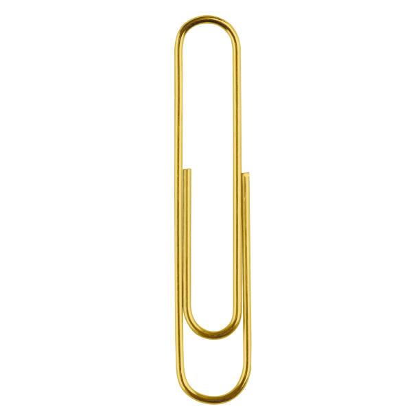 istock Golden paper clip isolated on white background. 2184307551
