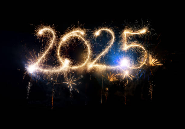 istock Sparkler Happy New Year 2025 with fireworks 2184308696