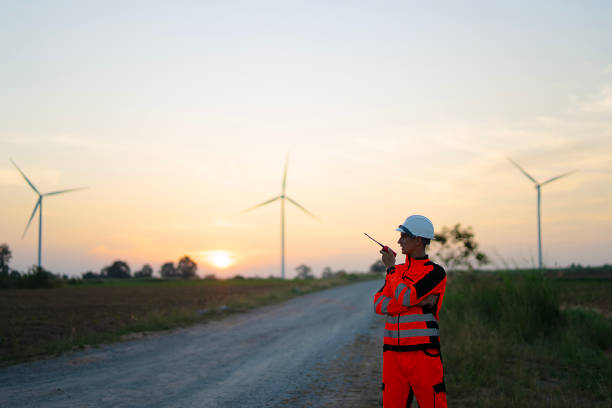 istock Engineer is working at windmills field for generate electricity. 2184308966