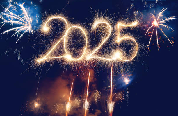 istock Sparkler Happy New Year 2025 with fireworks 2184309281