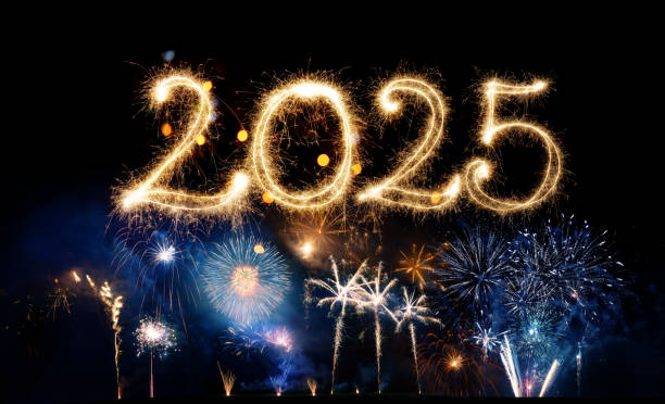 istock Sparkler Happy New Year 2025 with fireworks 2184309893