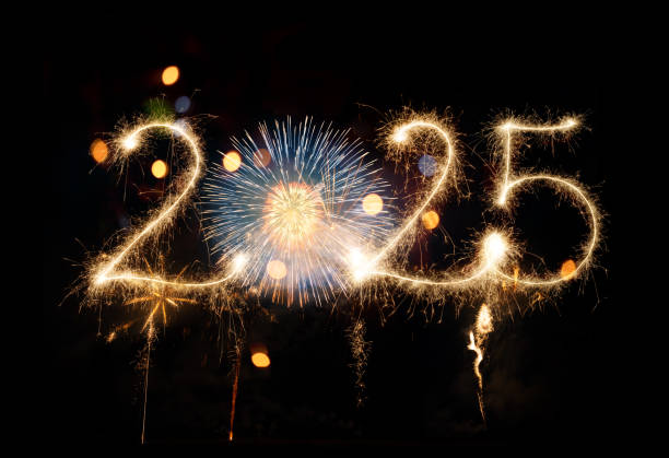 istock Sparkler Happy New Year 2025 with fireworks 2184311869