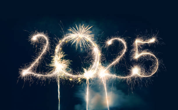istock Sparkler Happy New Year 2025 with fireworks 2184312201