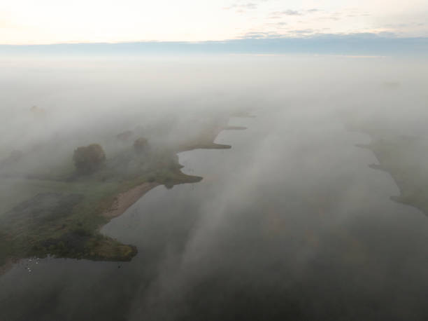 Vyssi Brod town in summer foggy morning with color buildings and fresh nature