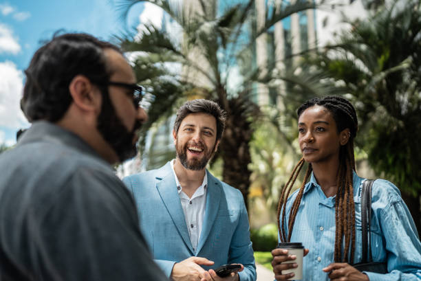 istock Coworkers talking in the street 2184316395