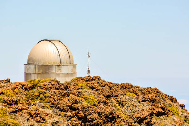 istock A large dome-shaped building with a telescope on top 2184316981