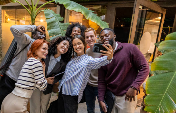 istock Multiracial business team taking a selfie in coworking space 2184320502