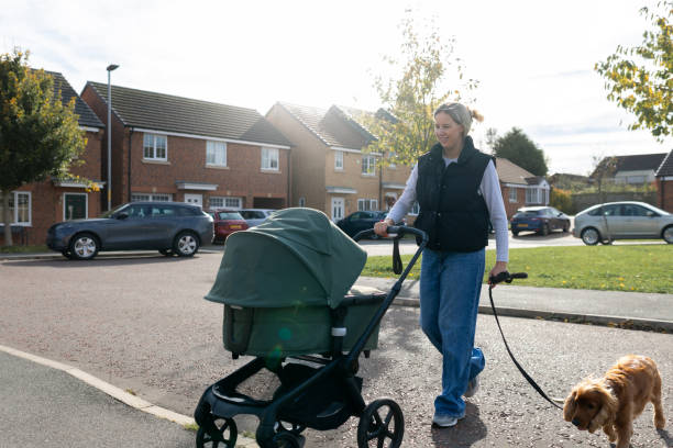 istock Crossing The Road With The Pushchair 2184321017