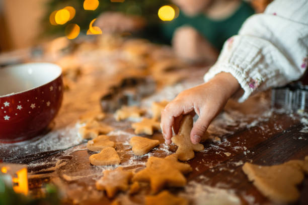 istock Children making Christmas cookies at home 2184325961