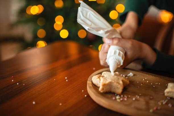 istock Child making Christmas cookies at home 2184326334