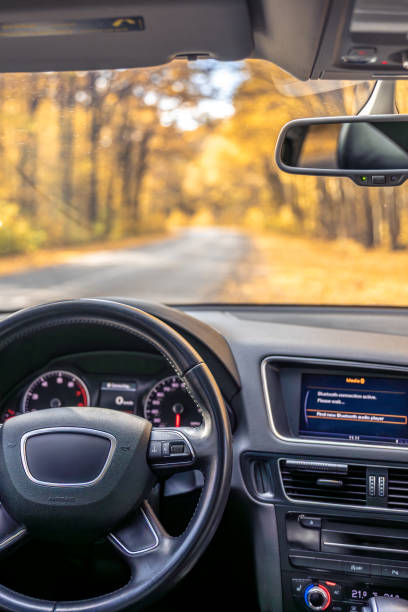 istock Car view from the inside. Car steering wheel and interior. 2184326653