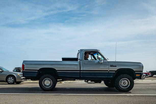 Gulfport, MS - October 04, 2023: Wide angle side view of a 1993 Dodge Power Ram 250 LE Regular Pickup at a local car show.