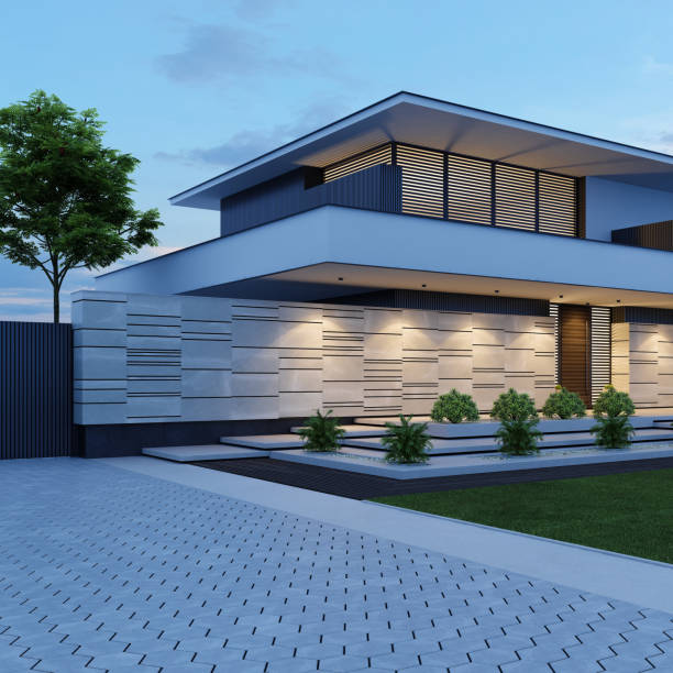 istock Contemporary Villa with Stunning Stone Facade and Front Yard at Sunset 2184332319