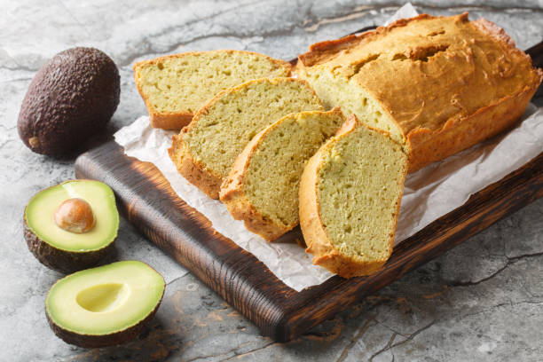 istock Freshly baked diet avocado bread close-up on wooden board. Horizontal 2184332691