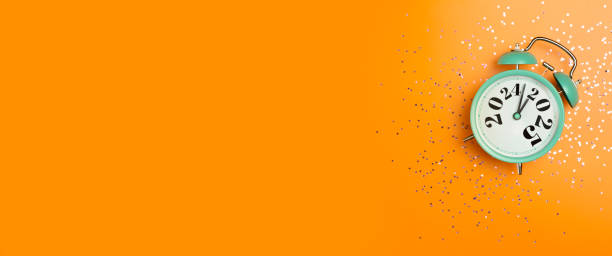 istock New Year 2025 background concept. 2024 changes to 2025 on an alarm clock on a colored background with festive glitter on New Year's Eve and Christmas. 2184336113