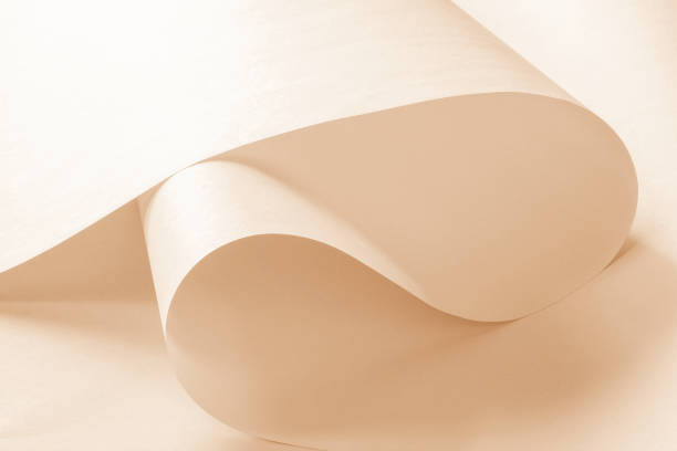 istock sheets of paper in warm colors. 2184339302