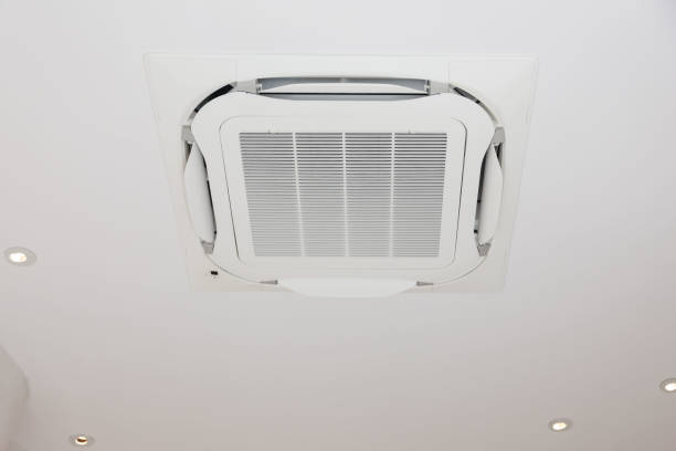 istock A white air conditioner is mounted on the ceiling 2184345932
