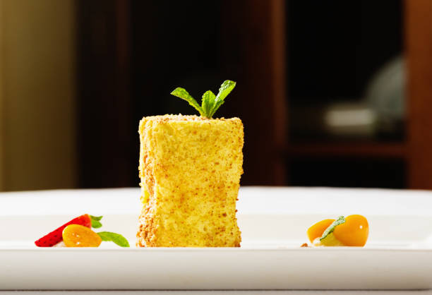Creamy cheesecake with a browned, crumbed exterior.