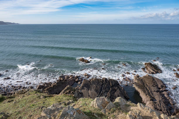 istock Clifftop view of Widemouth Bay rugged rocks 2184354896