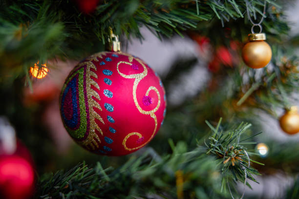 Christmas tree with beautiful decor indoors.