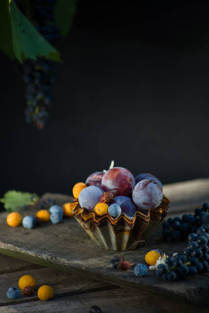natural still life autumn fair colored fruits in rustic style.