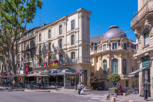 Provence, France - June 23, 2016: Shopping streets and emblematic buildings in the historic center of the city of Avignon