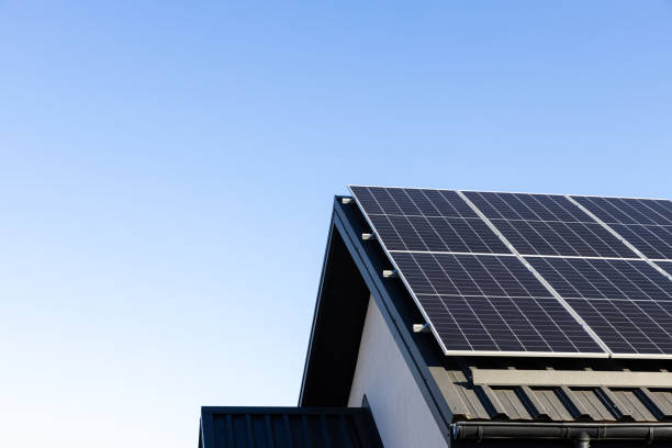 istock Solar panels system installed on house metal sheet roof, alternative energy 2184367969