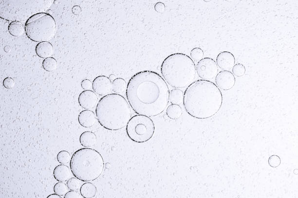 istock Soda bubble texture macro,set water bubble black oxygen air, in underwater clear liquid with bubbles flowing up on the water surface, isolated on a white background 2184370468