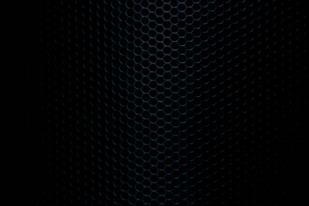istock Close-up of black speaker background,Black speaker grid - high resolution,Abstract black metallic mesh texture for background. Industrial backdrop. The speaker of a musical column. Panoramic horizontal high-resolution photography. 2184370487