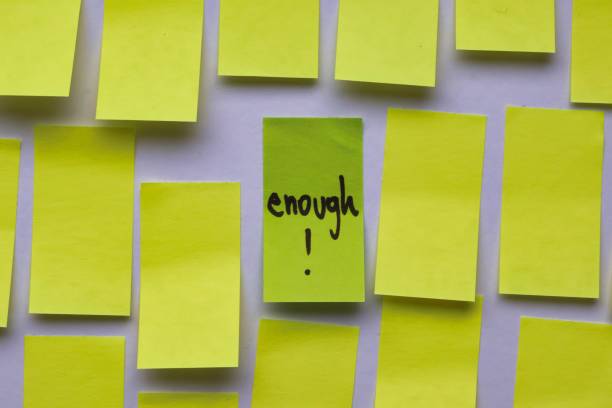 istock Enough!; Concept with sticky notes with handwritten inscription 2184376713