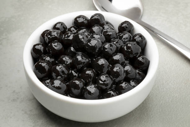 istock Bowl with cooked black tapioca pearls close up 2184378272