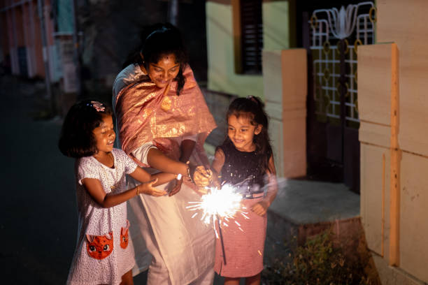 istock Diwali Family Sparkle 2184378671