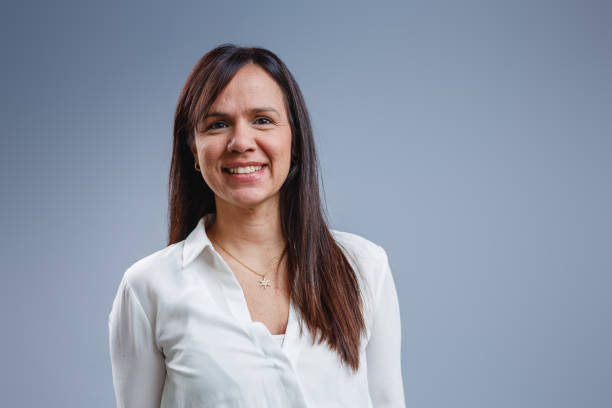 istock Portrait of a Hispanic Business Professional Smiling in Studio 2184380672