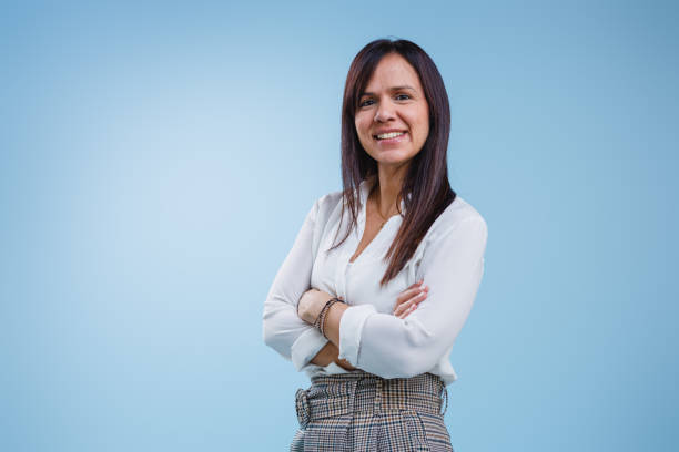 istock Portrait of Hispanic Business Professional in Studio with Joyful Expression 2184380827