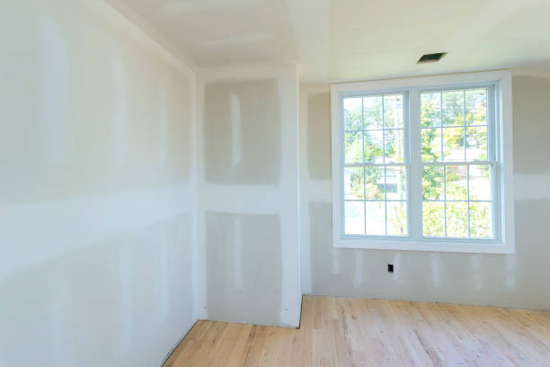 istock During construction, drywall is partially completed, but a interior is unpainted drywall 2184382420