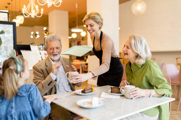 istock Grandparent spending time with granddaughter at cafe 2184382521