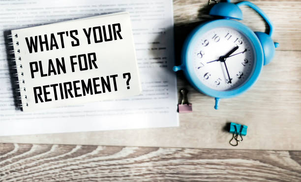 istock What are your retirement plans? it is written in a notebook on a gray background with documents and a watch 2184385554