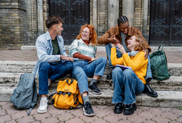 istock College students hanging out on campus 2184388289