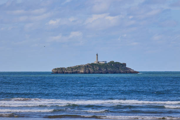 istock Mouro Island Lighthouse on the rocky island in Santander 2184389689