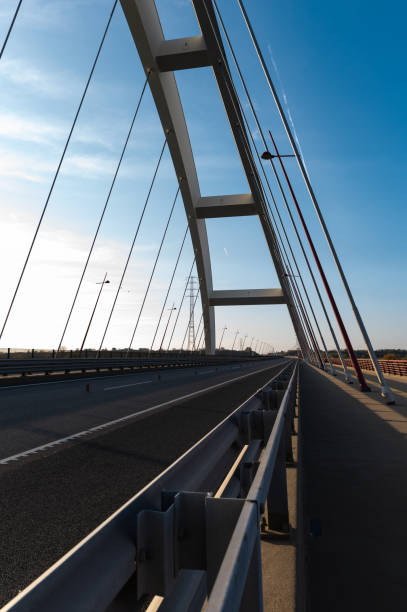istock Perspective view of the Pentele Bridge with cables and guardrail 2184391404