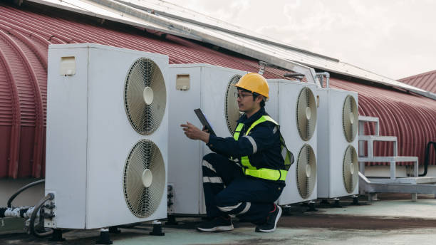 Engineers is checking the air conditioning cooling system of a major building or industrial facility.