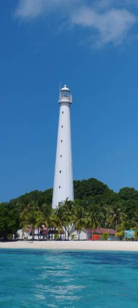 istock lighthouse at lengkuas island under blue sky, belitung indonesia 2184398873