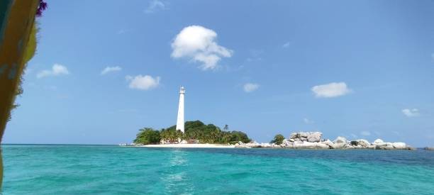istock lighthouse at lengkuas island under blue sky, belitung indonesia 2184398877