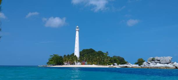 istock lighthouse at lengkuas island under blue sky, belitung indonesia 2184398883