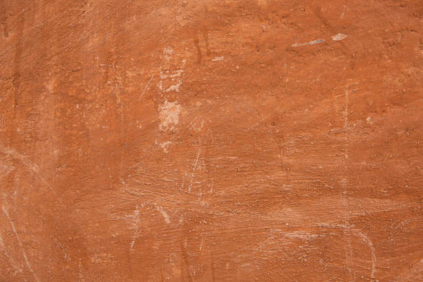 istock Slightly brownish orange striped and weathered antique wall texture 2184400096