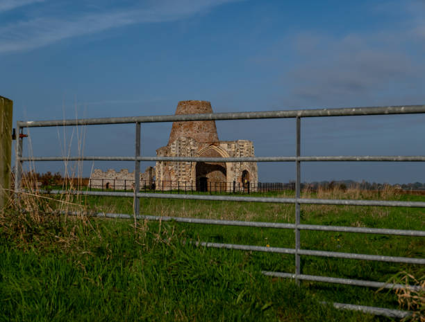 istock Historic abbey ruins behind a metal gate 2184400175