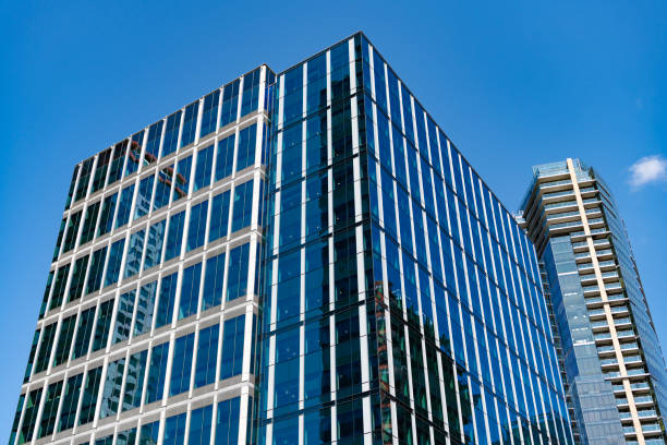 istock Skyscraper building architecture. Skyscraper with glassy facade. Modern city perspective. Skyscraper in historical metropolis city. City downtown with skyscraper in perspective. Perspective view 2184404137