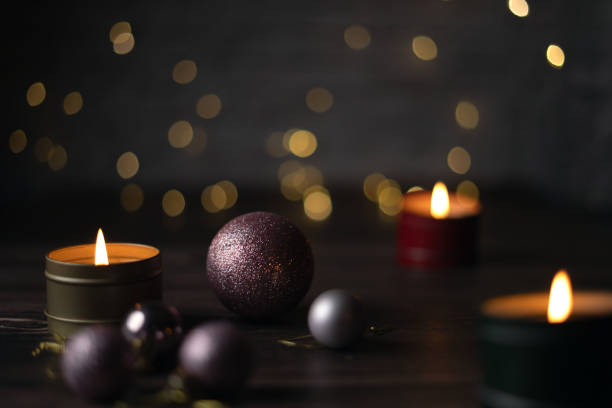 photoCaptivating Candlelit Ambiance with Festive Decor Elements Creating a Warm and Inviting Atmosphere for Relaxation and Holiday Celebrations